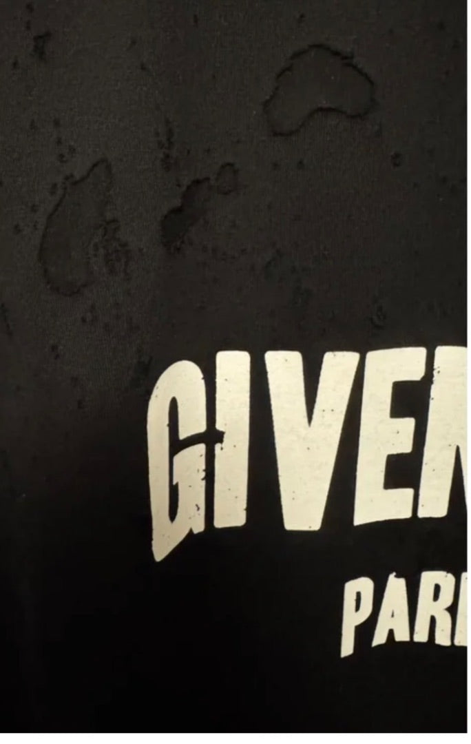 Givenchy Distressed T-shirt with see through holes