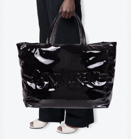 Saint Laurent logo-debossed tote bag with a high-shine patent finish