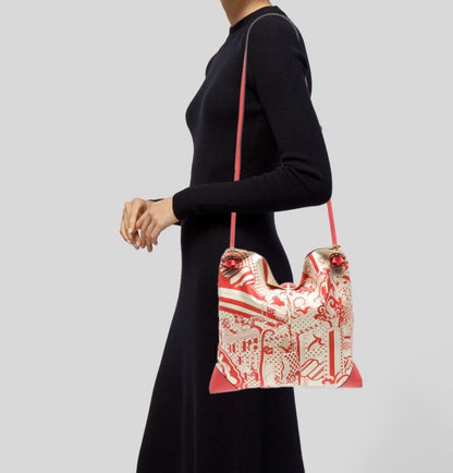 Hermes Hermès 2024 'Faubourg Rainbow' Silky City 33 shoulder bag in printed silk and orange calfskin leather.