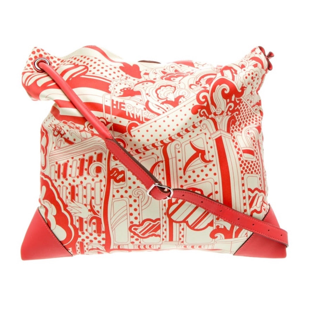 Hermes Hermès 2024 'Faubourg Rainbow' Silky City 33 shoulder bag in printed silk and orange calfskin leather.