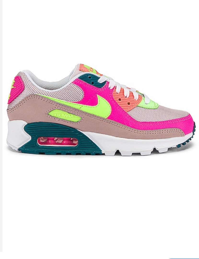Nike Air Max 90 sneakers, specifically identified in a "Rose Ghost Green Volt" or neon "Exeter Edition" colorway