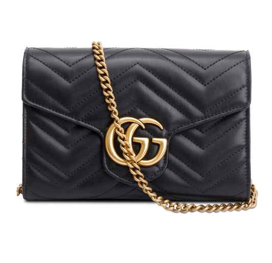 Gucci GG Marmont matelassé leather wallet on chain.