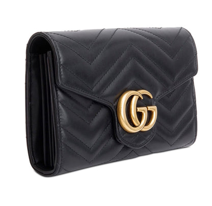 Gucci GG Marmont matelassé leather wallet on chain.