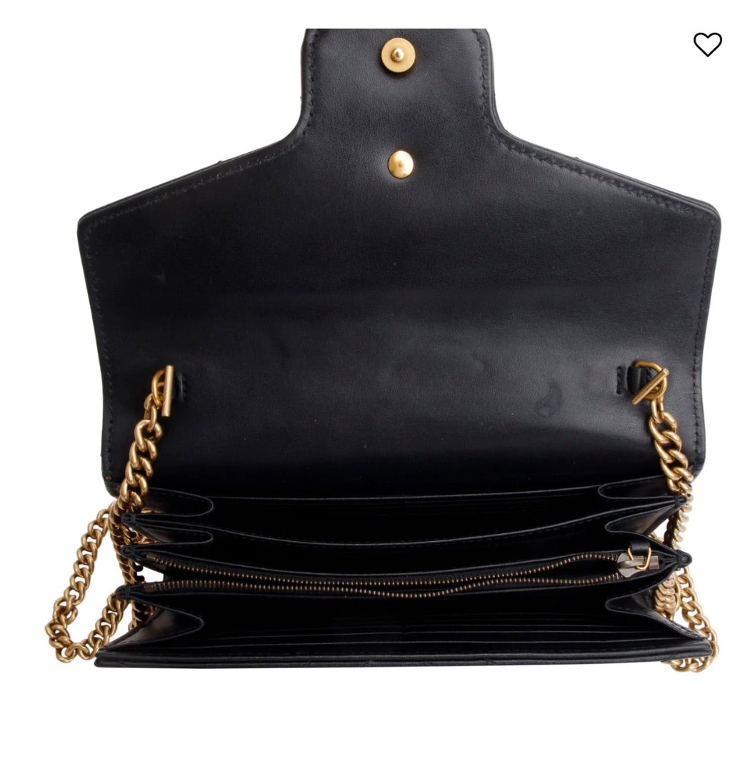 Gucci GG Marmont matelassé leather wallet on chain.