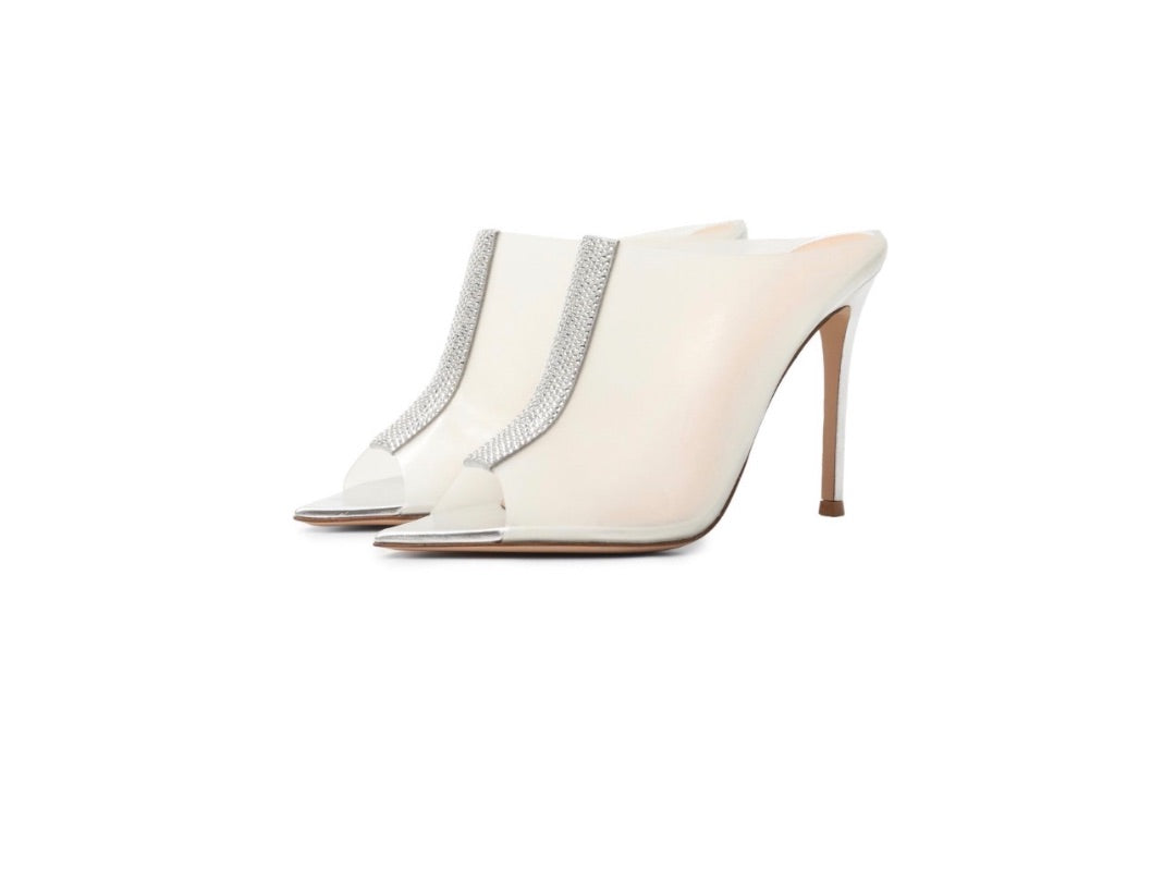 Gianvito Rossi Sigma mules feature a distinctive crystal-encrusted