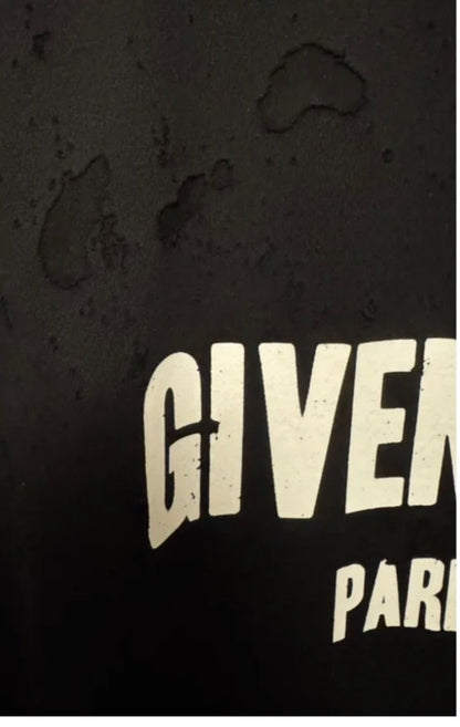 Givenchy Distressed T-shirt with see through holes