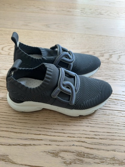 Tods Kate slip-on sneakers featuring a gray stretch-knit upper and a leather chain-style strap detail